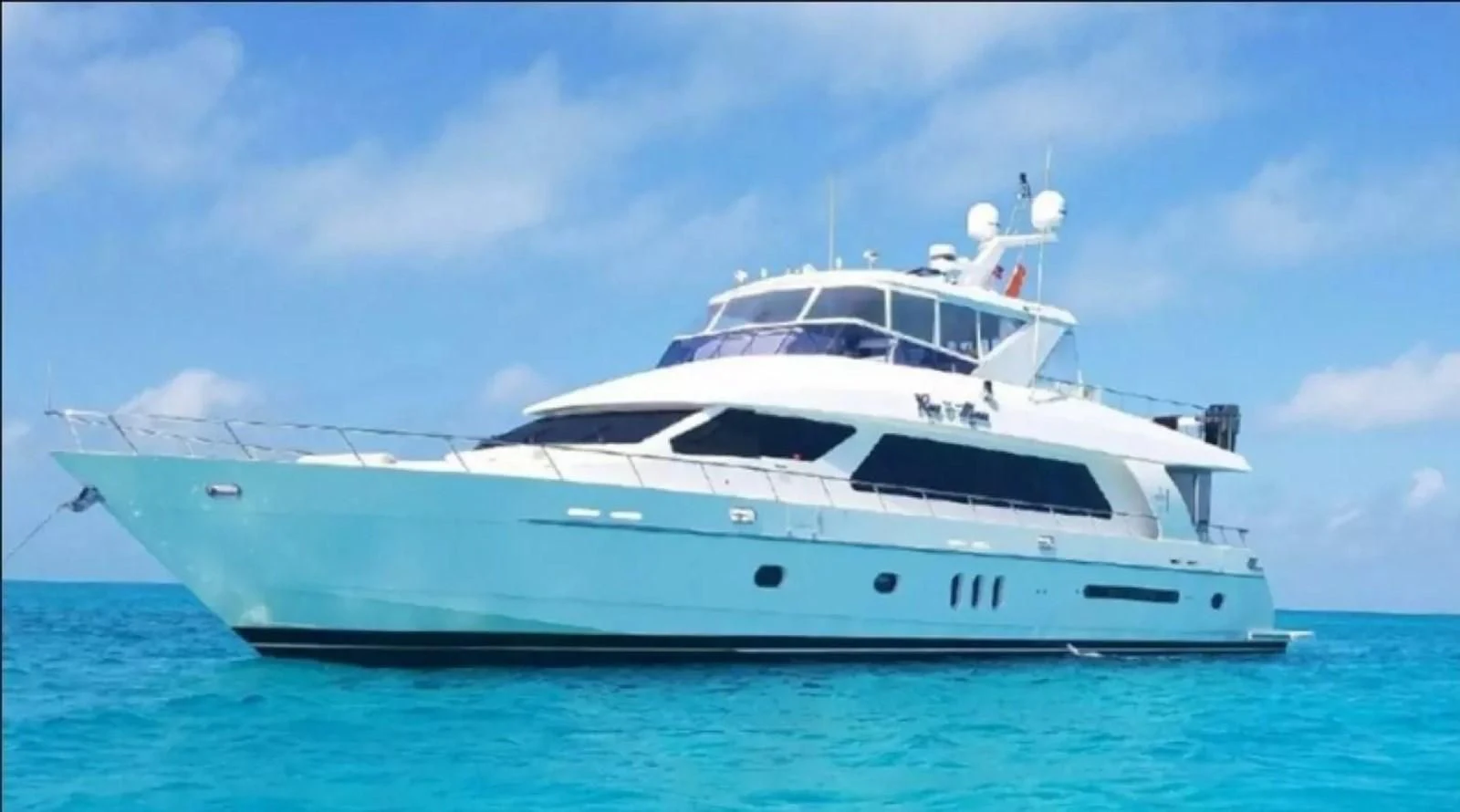 a white yacht in the water aboard ROXY MARIA Yacht for Sale