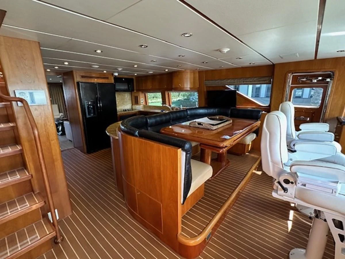 a room with a bed and desk aboard ROXY MARIA Yacht for Sale