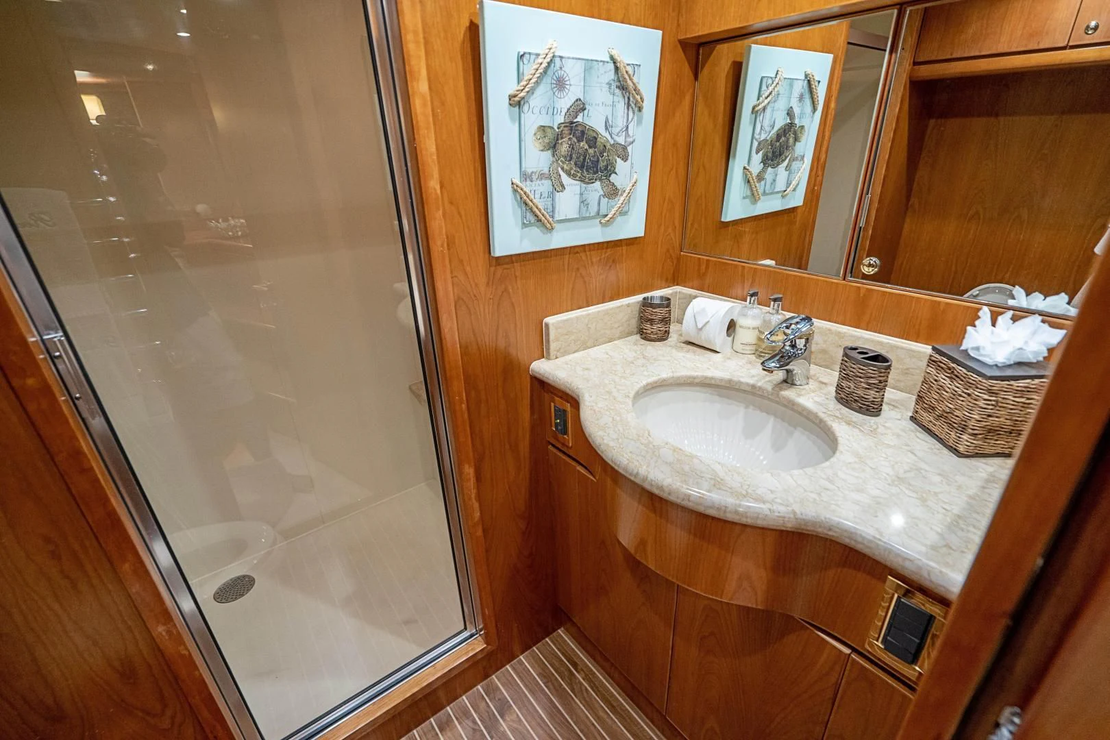 a bathroom with a sink and a mirror aboard ROXY MARIA Yacht for Sale