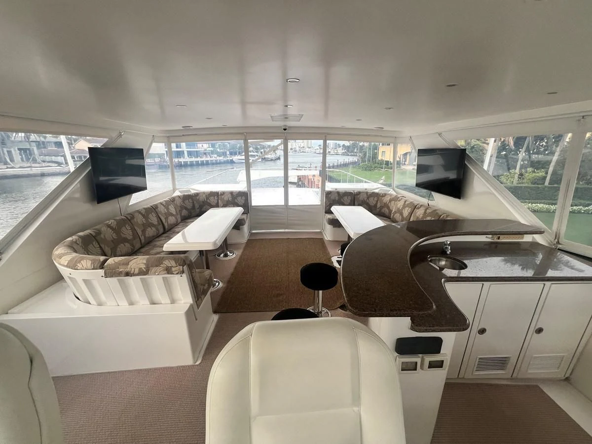 a room with a couch and a table and a view of the ocean aboard ROXY MARIA Yacht for Sale