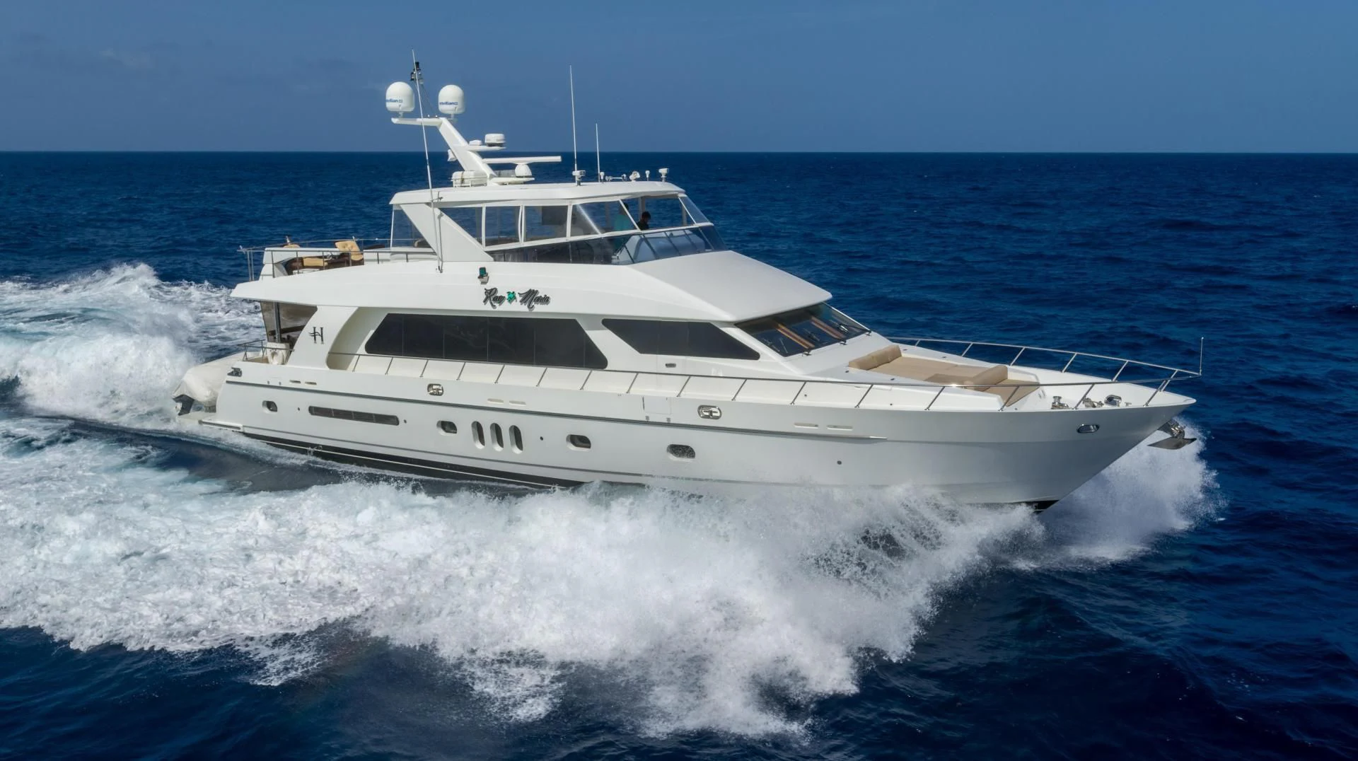 a white yacht on the water aboard ROXY MARIA Yacht for Sale