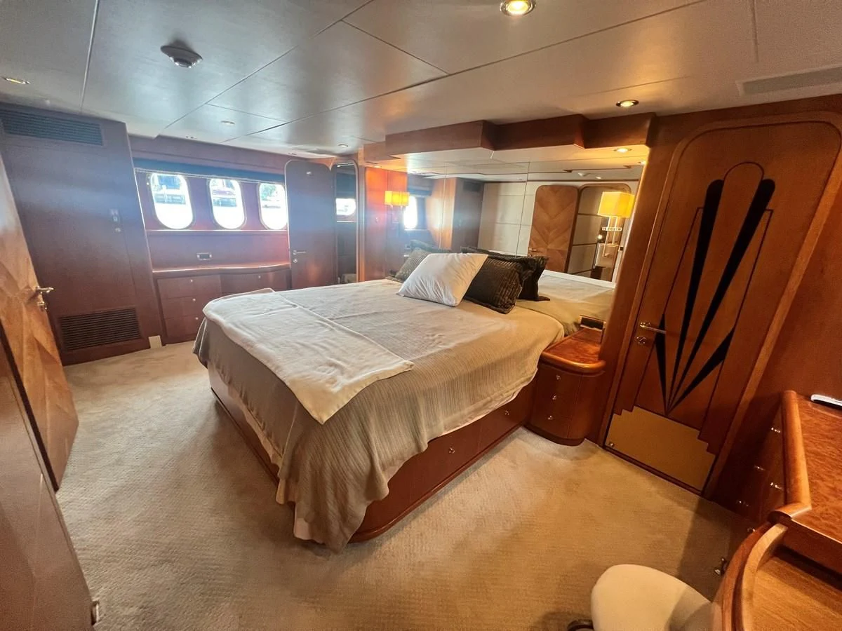 a bed in a room aboard ROXY MARIA Yacht for Sale