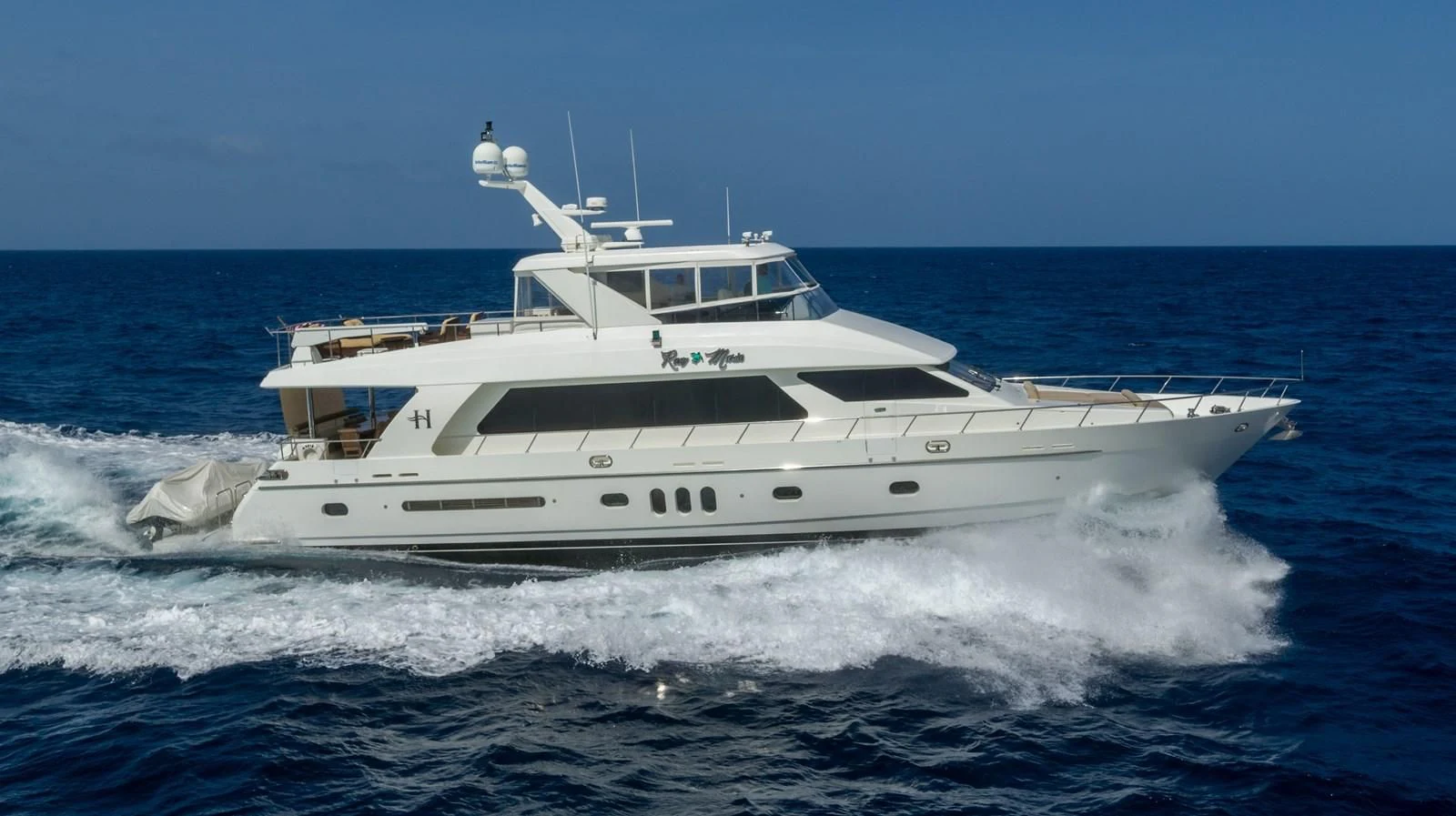 a white yacht on the water aboard ROXY MARIA Yacht for Sale
