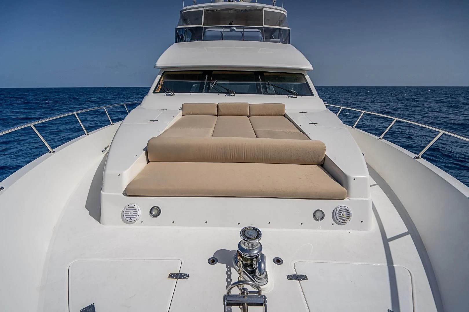 a white yacht with a faucet on the front aboard ROXY MARIA Yacht for Sale