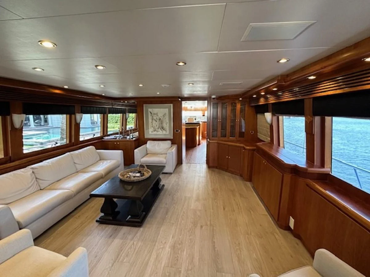 a living room with a wood floor aboard ROXY MARIA Yacht for Sale