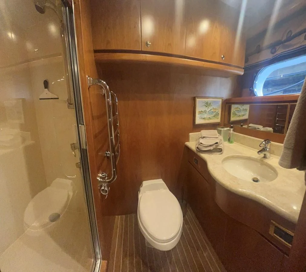 a bathroom with a toilet and sink aboard ROXY MARIA Yacht for Sale