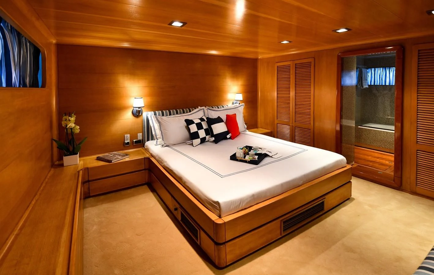 a bed in a room aboard SOMETHING COOL Yacht for Charter