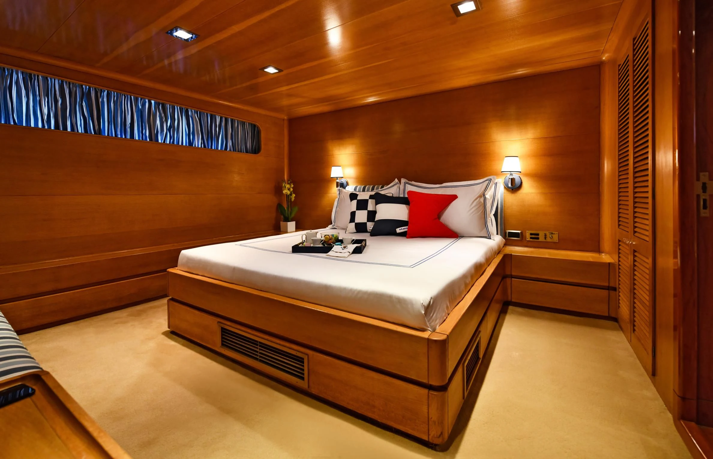 a bed in a room aboard SOMETHING COOL Yacht for Charter