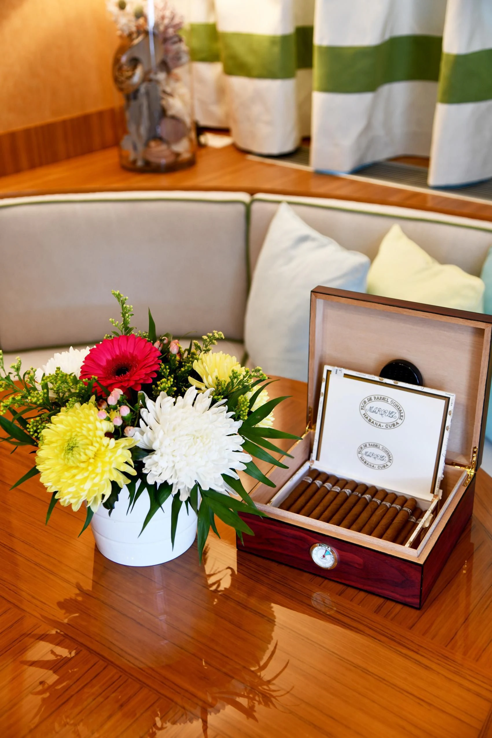 a flower in a vase aboard SOMETHING COOL Yacht for Charter