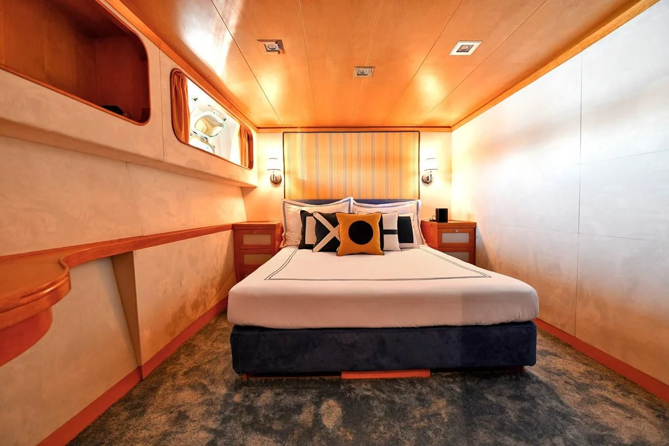 a bed in a room aboard SOMETHING COOL Yacht for Charter