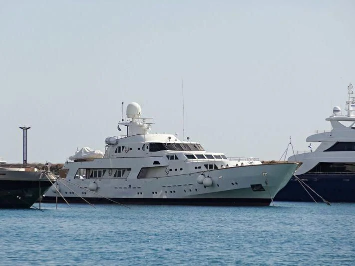 a couple of boats docked aboard SOMETHING COOL Yacht for Charter