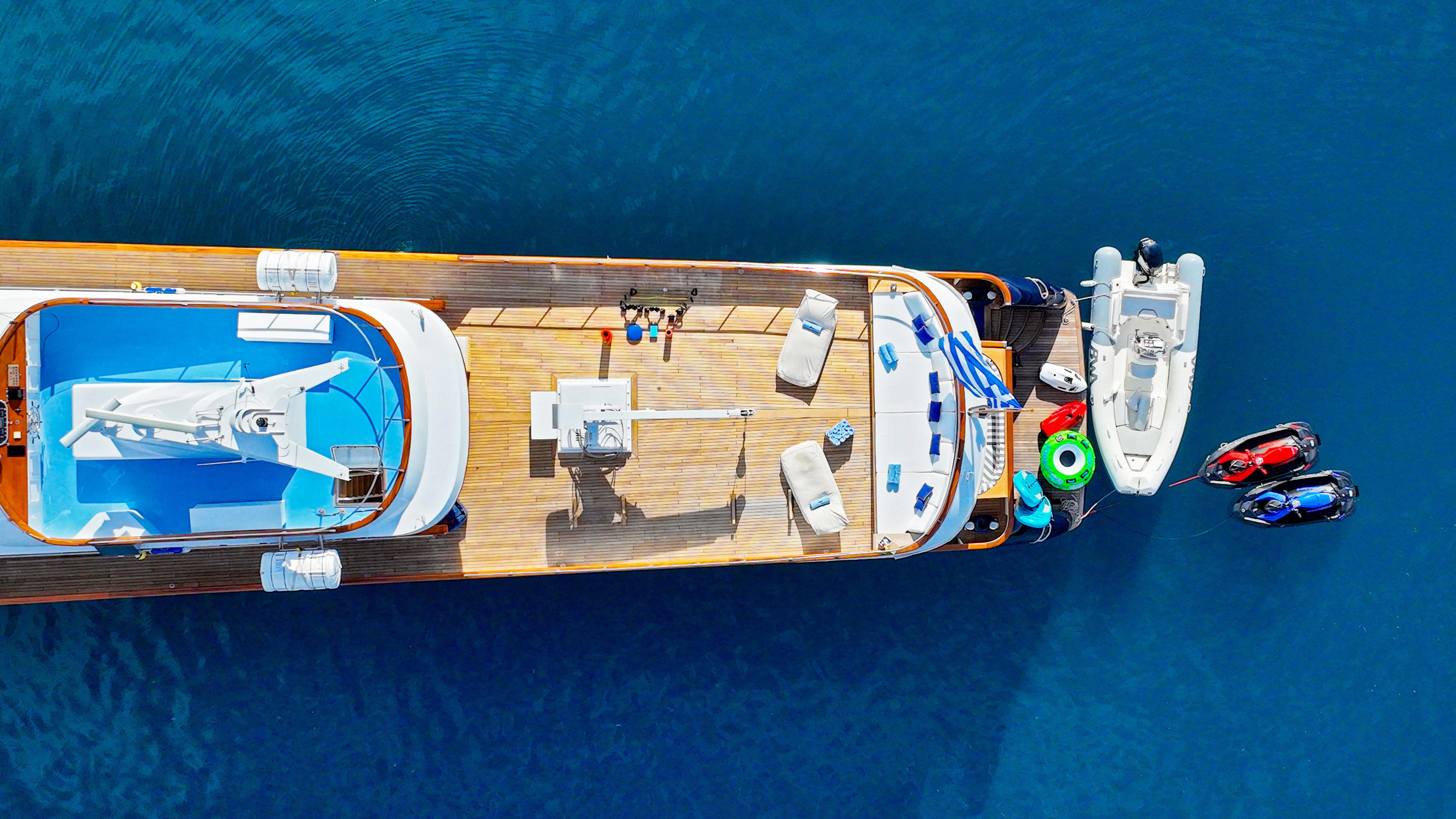 a wooden toy boat aboard SOMETHING COOL Yacht for Charter