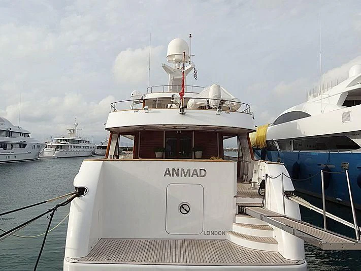 a boat docked at a pier aboard SOMETHING COOL Yacht for Charter