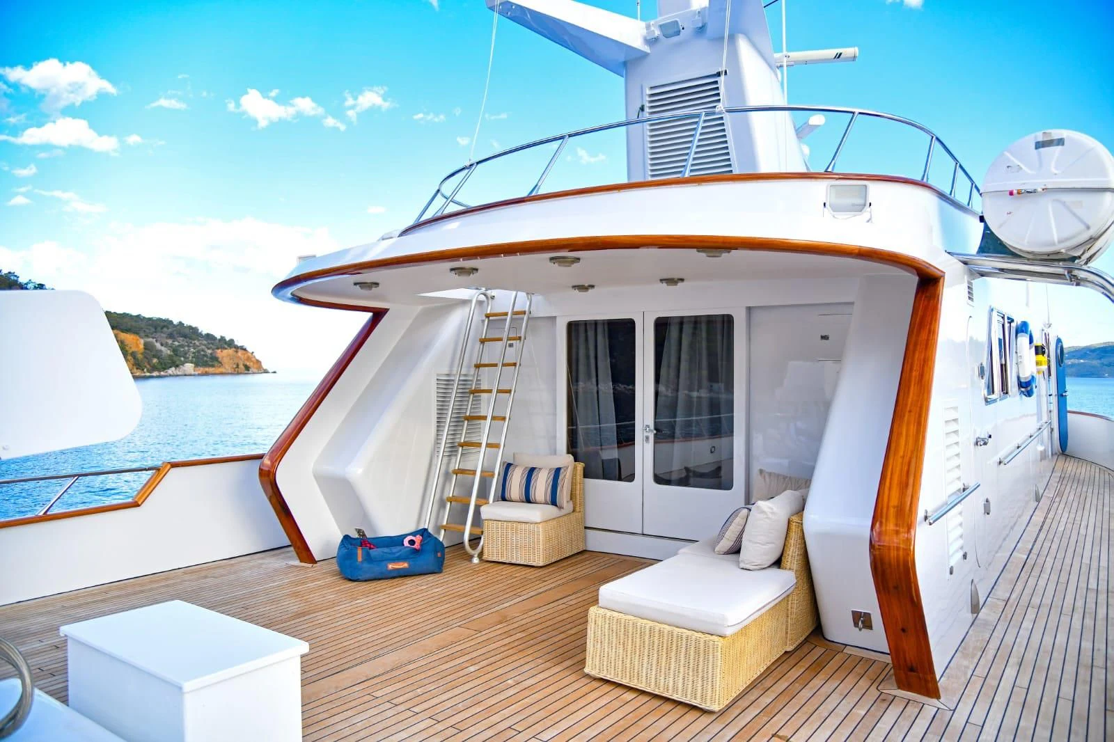 a boat on a dock aboard SOMETHING COOL Yacht for Charter