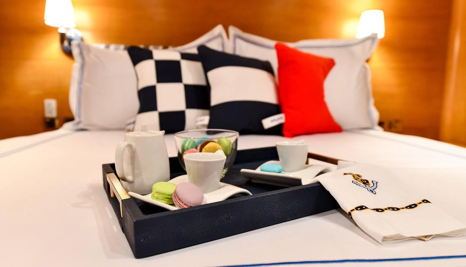 a tray with a tray of food and cups on it aboard SOMETHING COOL Yacht for Charter