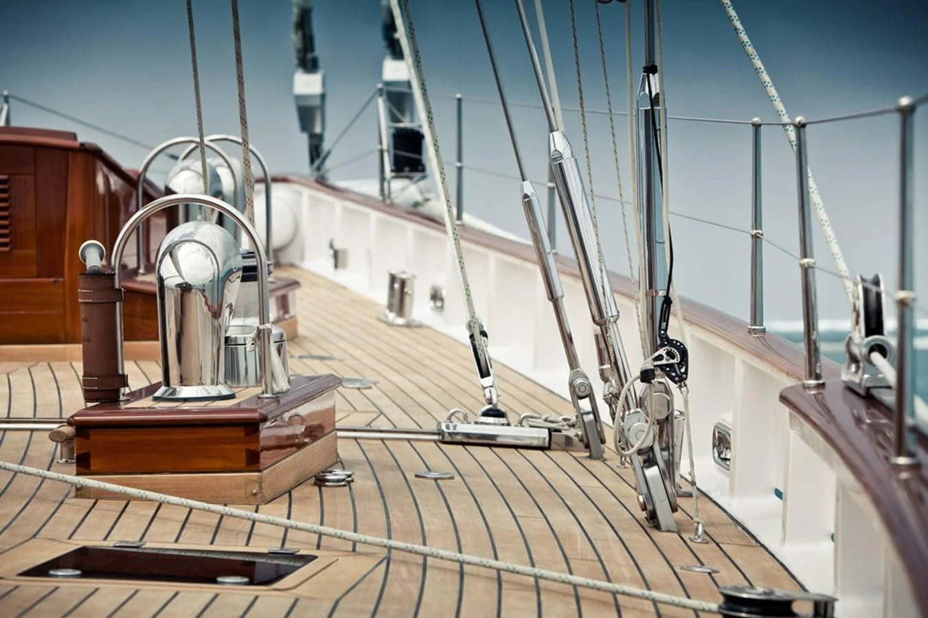 a large ship with a large ship in the background aboard URIEL Yacht for Sale
