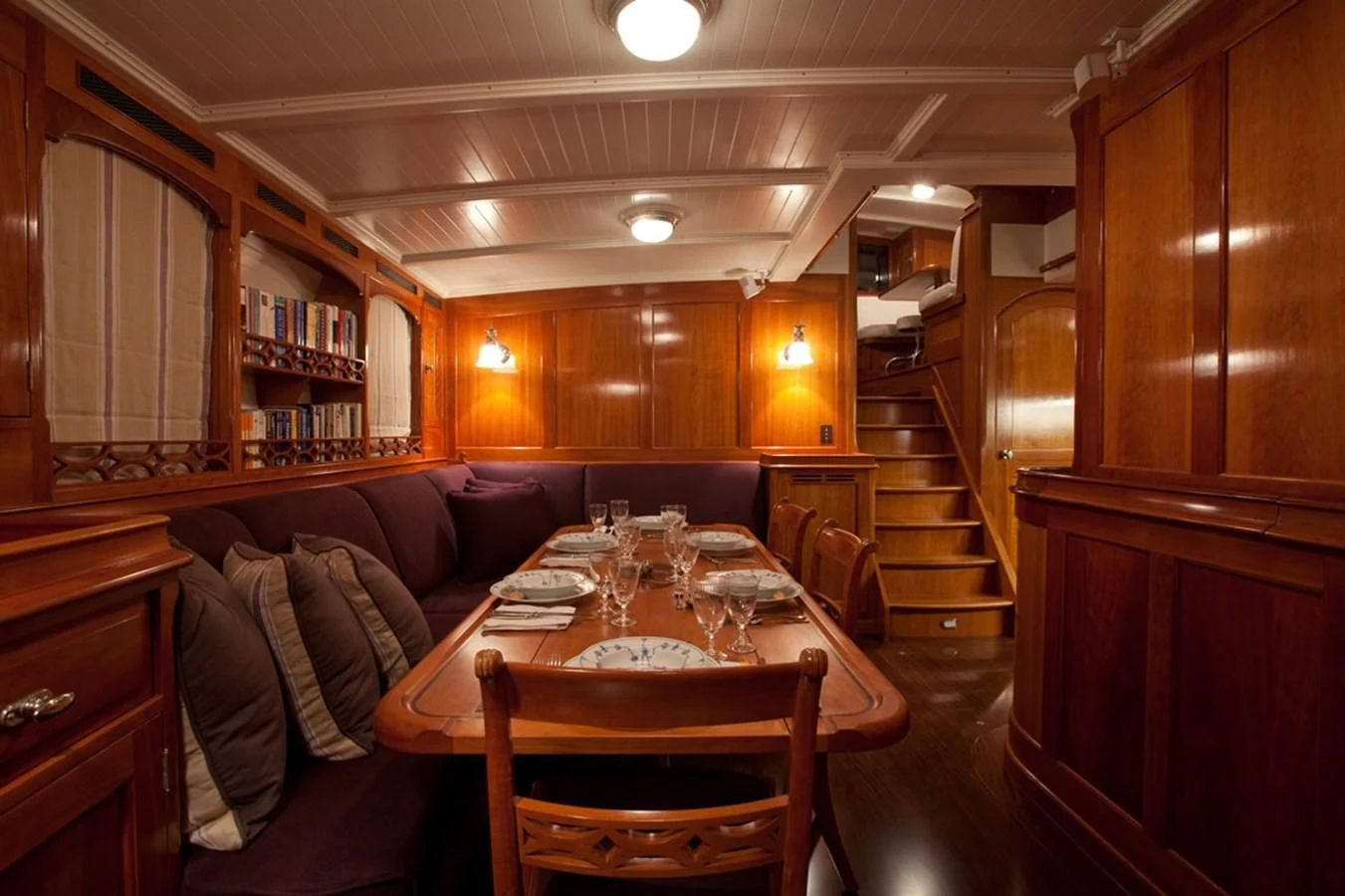 a dining table in a cabin aboard URIEL Yacht for Sale