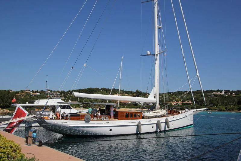 a boat docked at a pier aboard URIEL Yacht for Sale