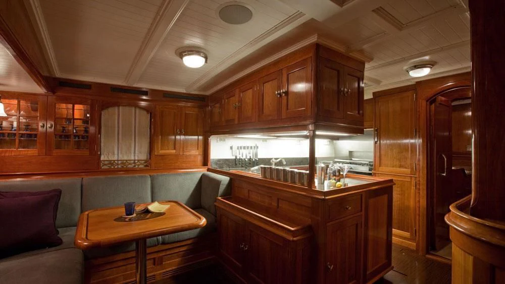 a kitchen and living room aboard URIEL Yacht for Sale