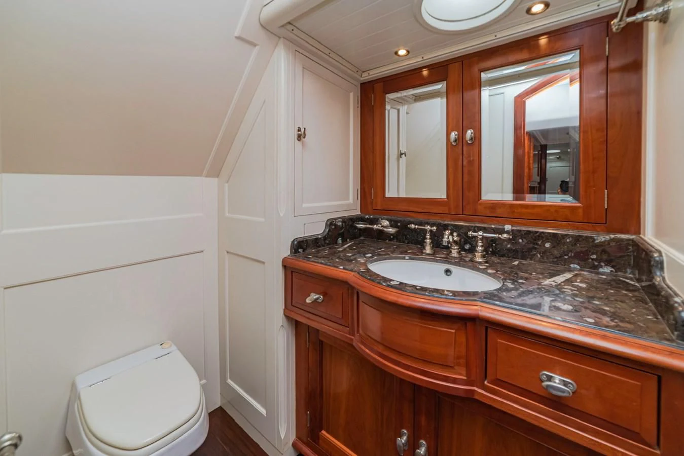 a bathroom with a marble counter top aboard URIEL Yacht for Sale