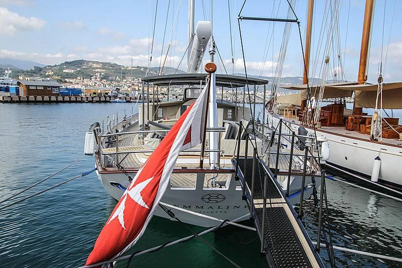 a boat tied to a dock aboard URIEL Yacht for Sale