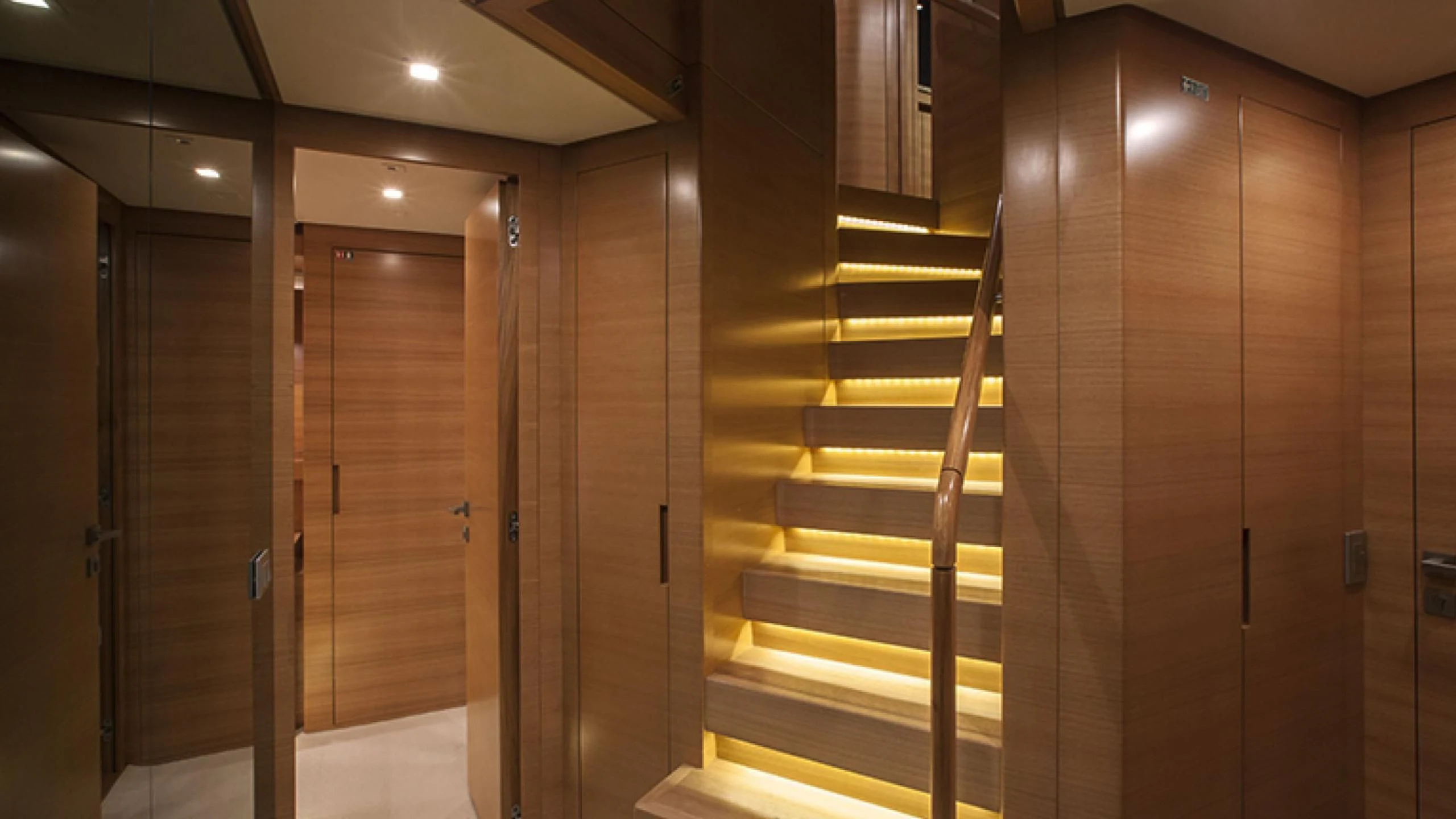 a room with a few doors aboard PERTULA Yacht for Sale