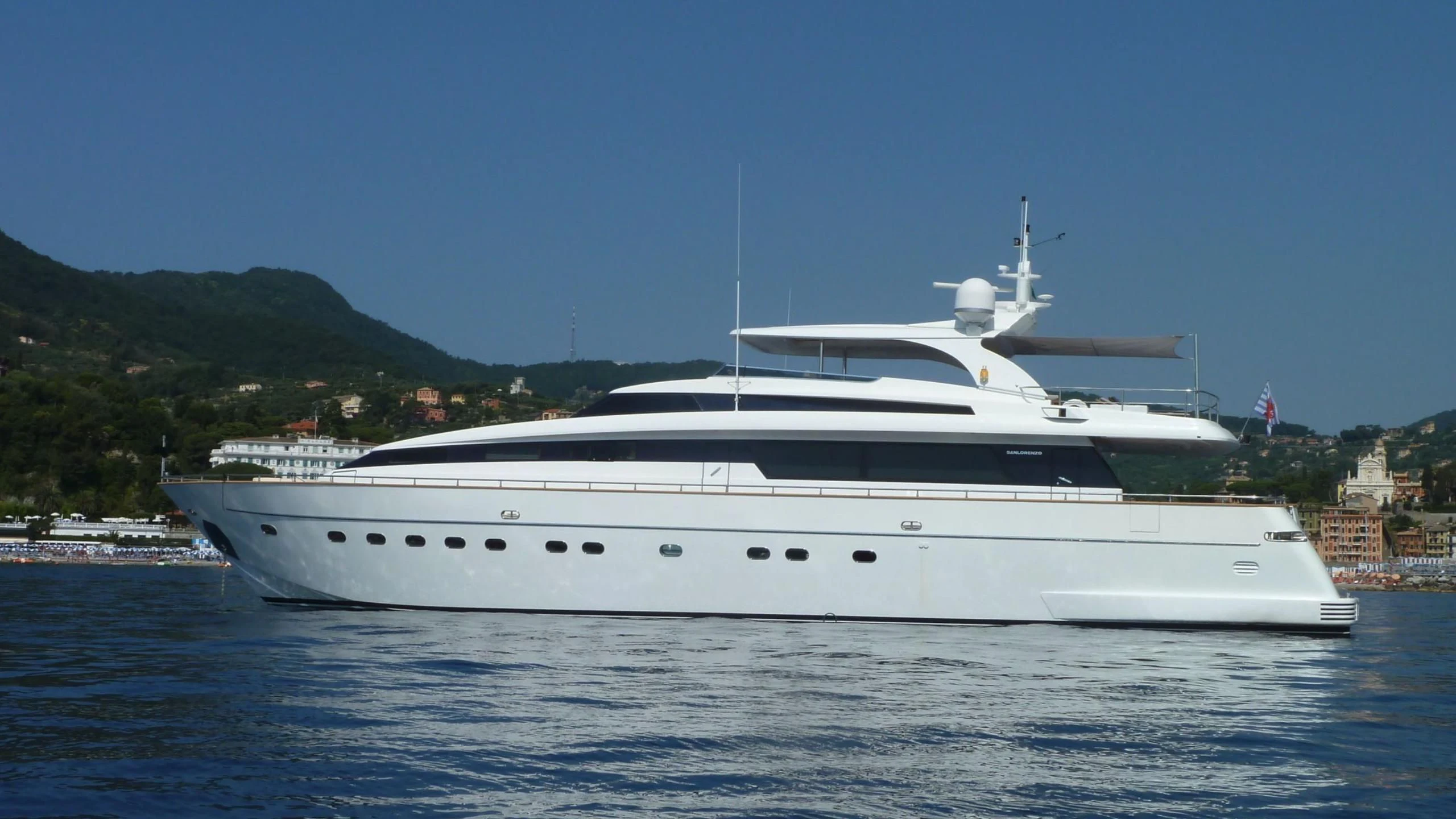 a white yacht in the water aboard PERTULA Yacht for Sale