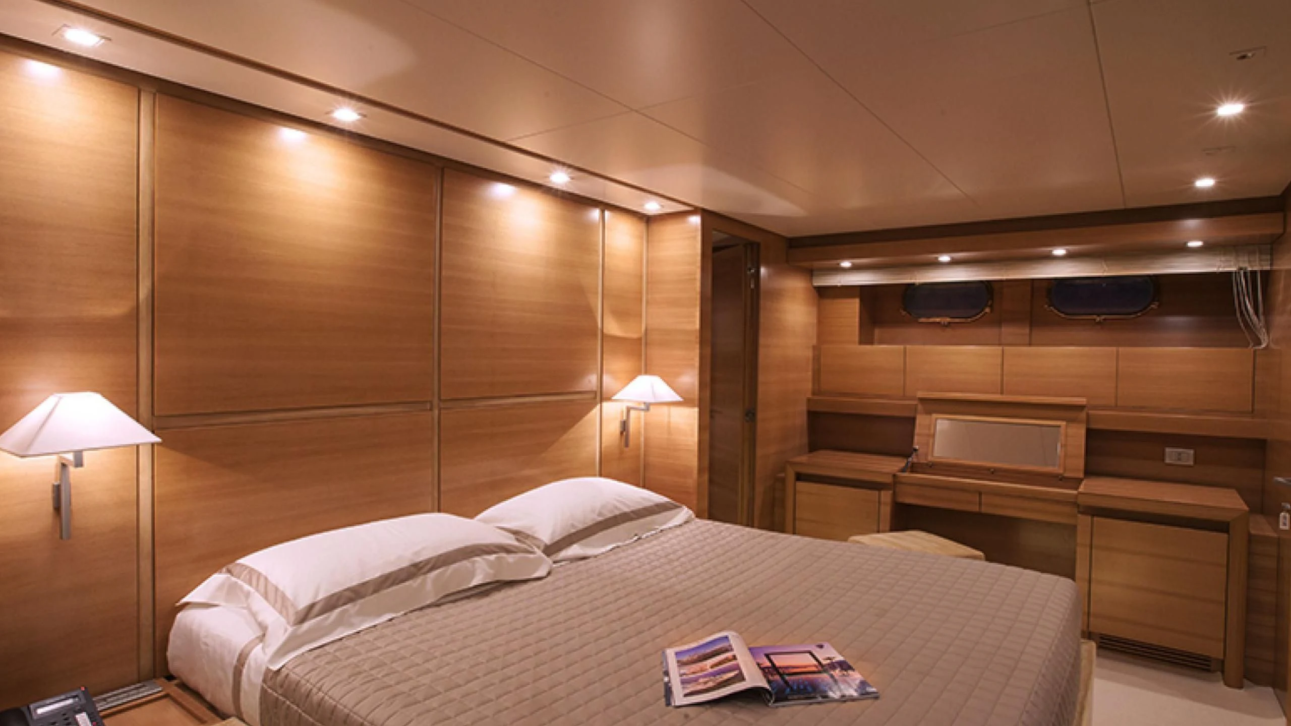 a bed in a room aboard PERTULA Yacht for Sale