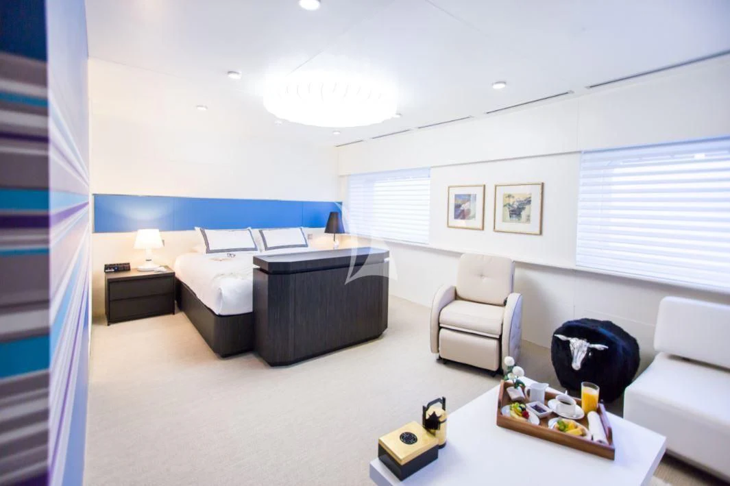 a living room with a couch and a table aboard SALUZI Yacht for Charter