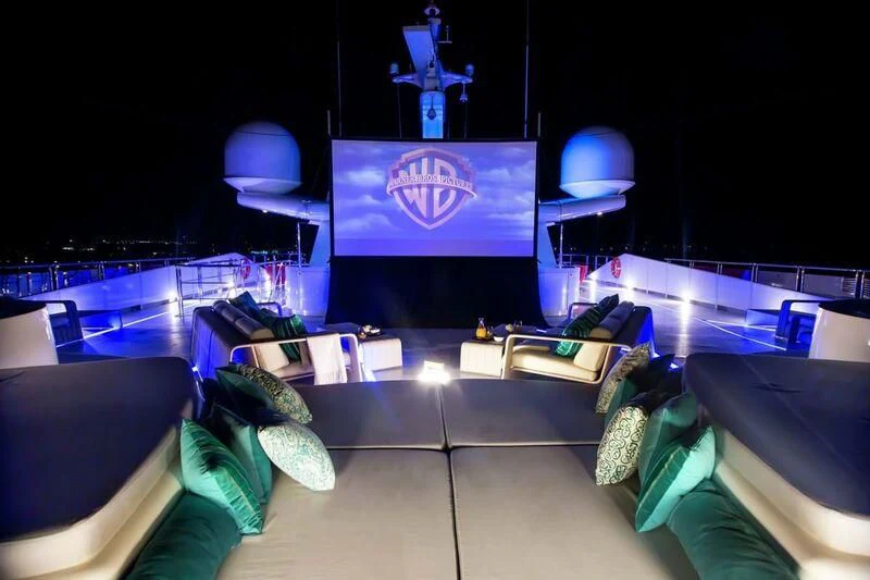 a room with a tv and a couch aboard SALUZI Yacht for Charter