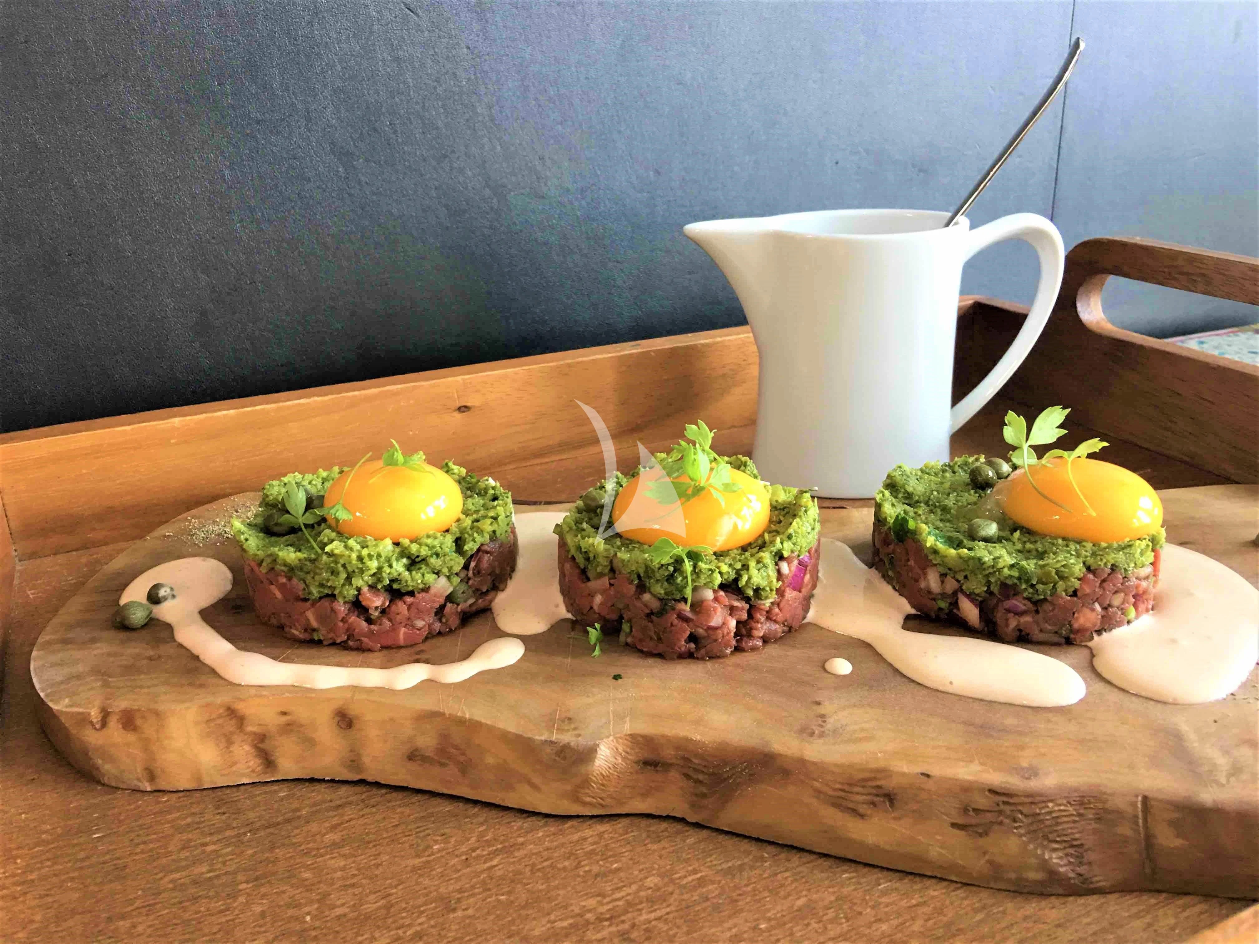 a plate of food aboard SALUZI Yacht for Charter