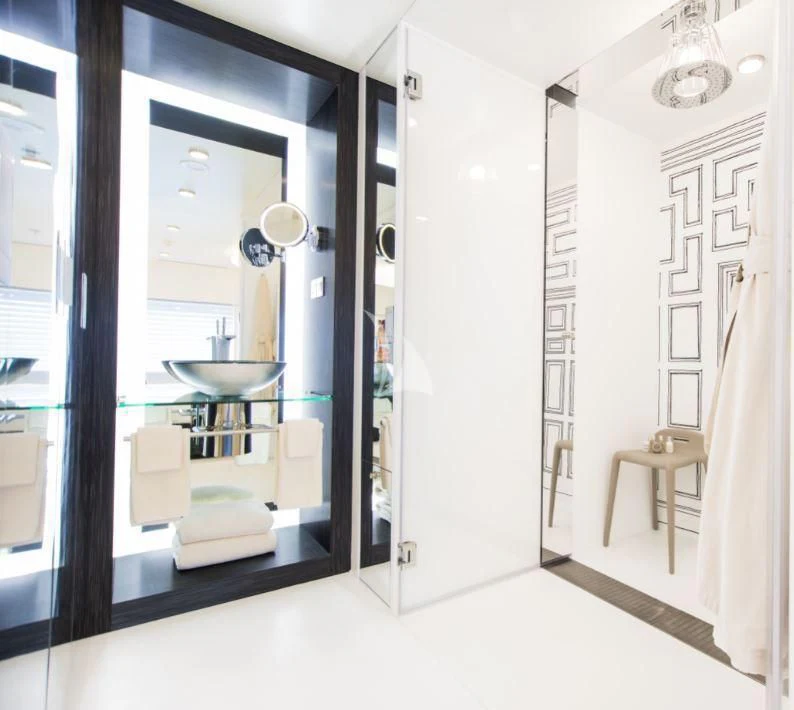a bathroom with a sink and mirror aboard SALUZI Yacht for Charter