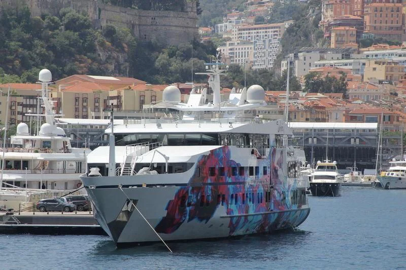 a boat docked at a port aboard SALUZI Yacht for Charter