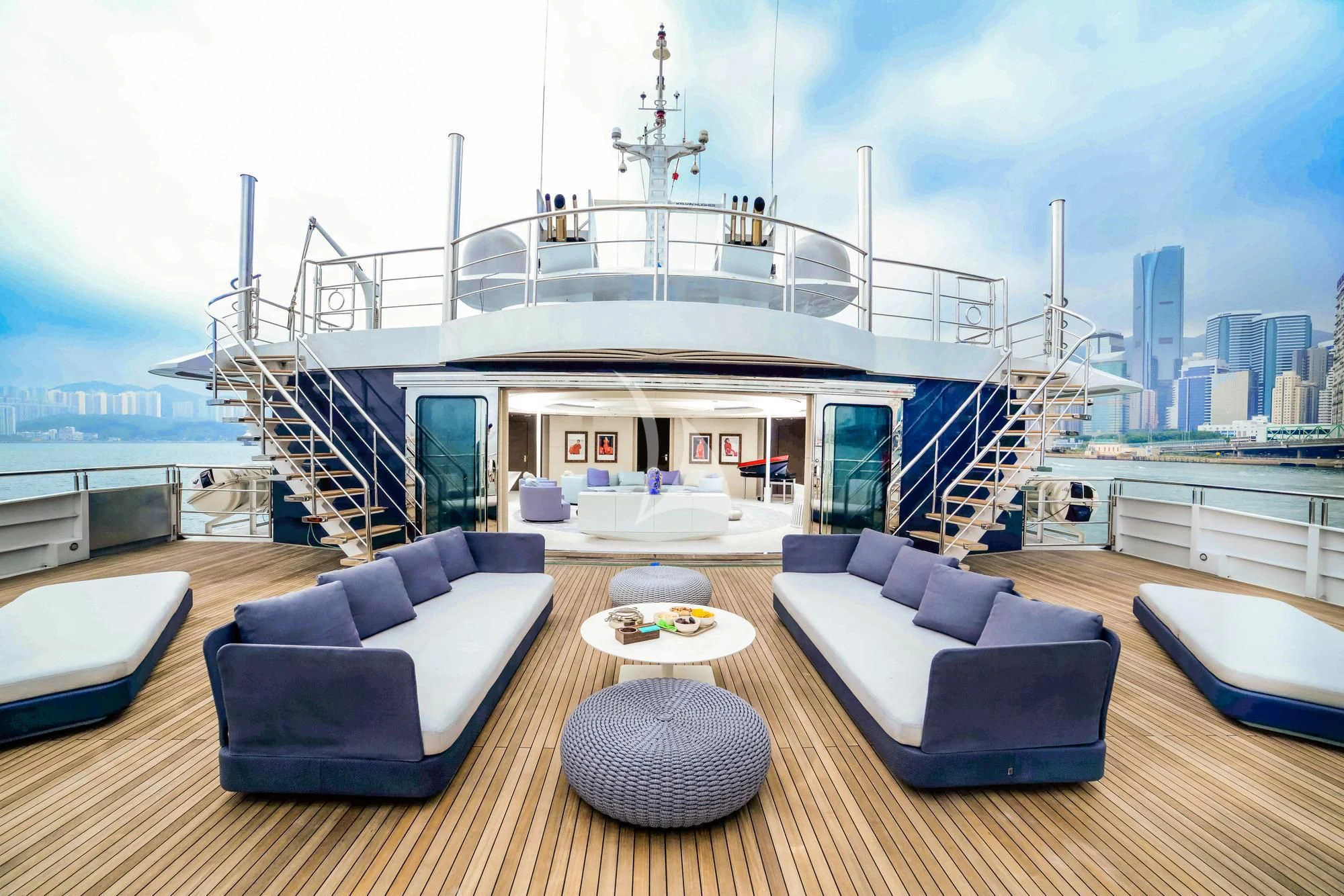 a living room with a large ship aboard SALUZI Yacht for Charter