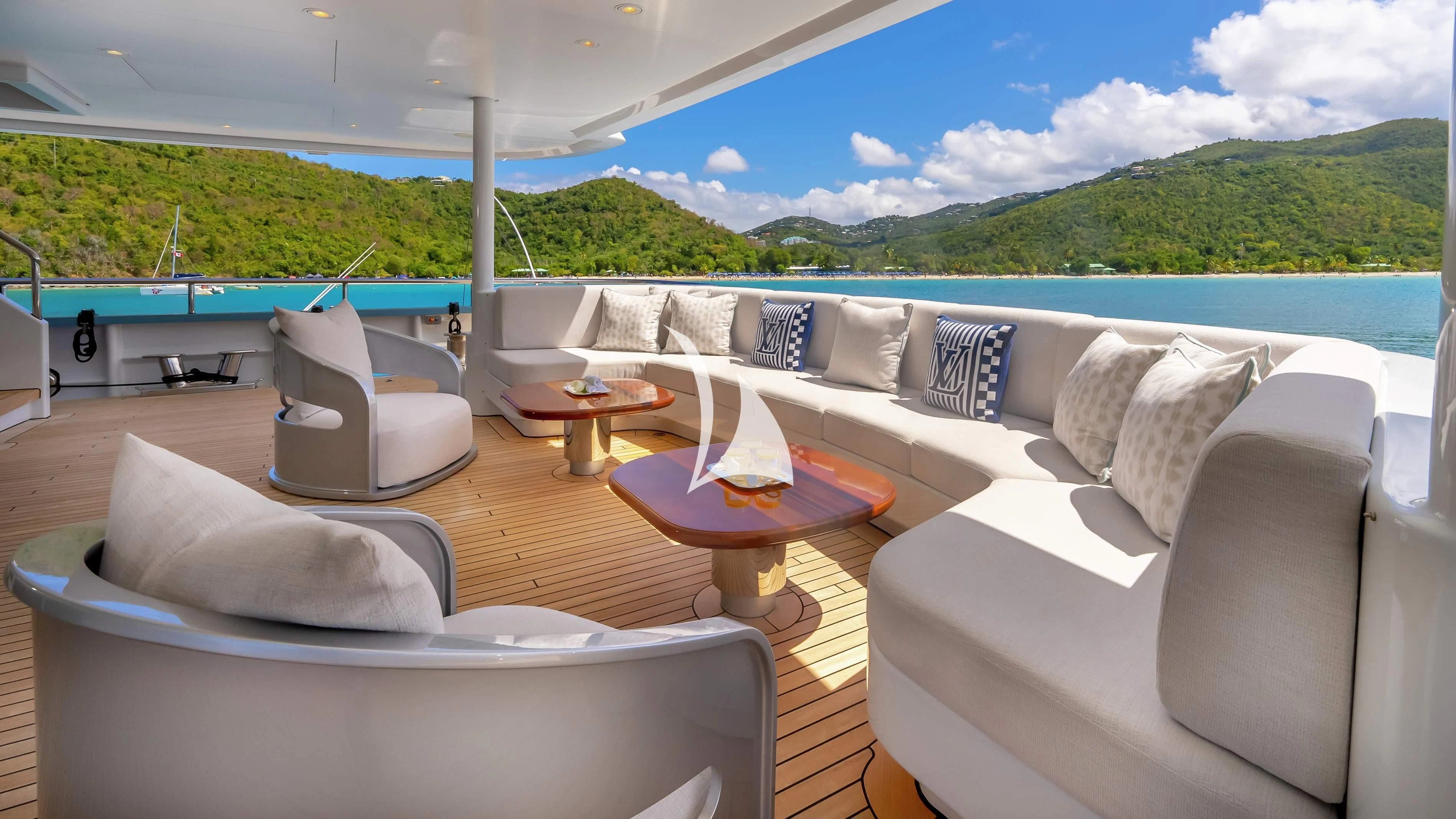 a living room with a large patio aboard SCOTT FREE Yacht for Charter