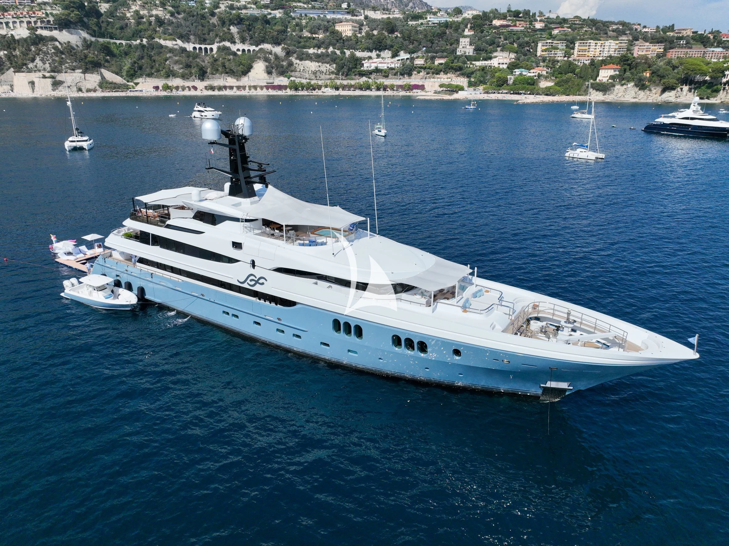 a large white boat in the water aboard SCOTT FREE Yacht for Charter