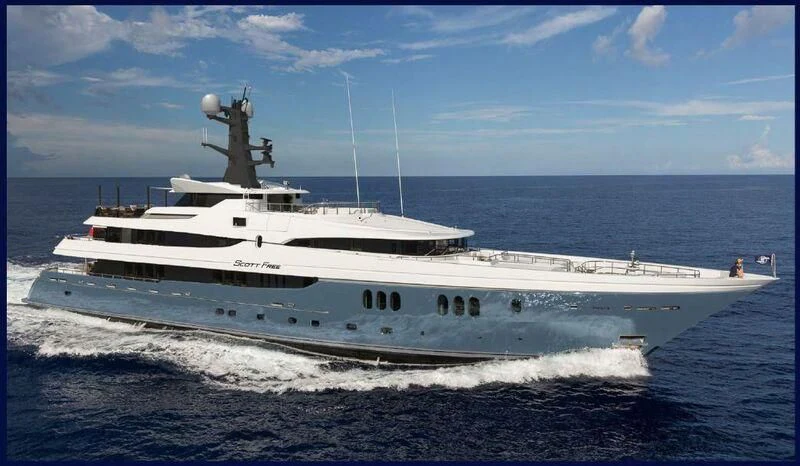 a large white ship on the beach aboard SCOTT FREE Yacht for Charter