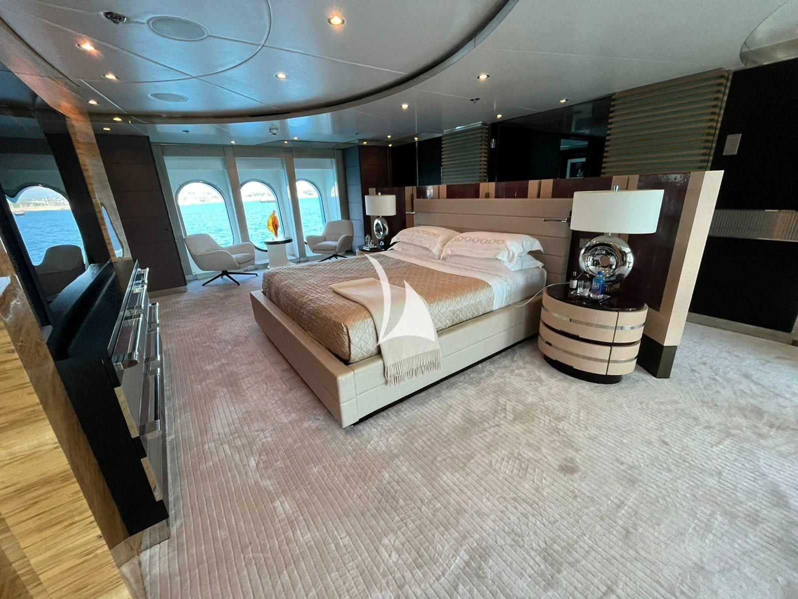 a bedroom with a bed and a desk aboard SCOTT FREE Yacht for Charter