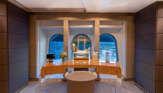 a room with a table and chairs aboard SCOTT FREE Yacht for Charter
