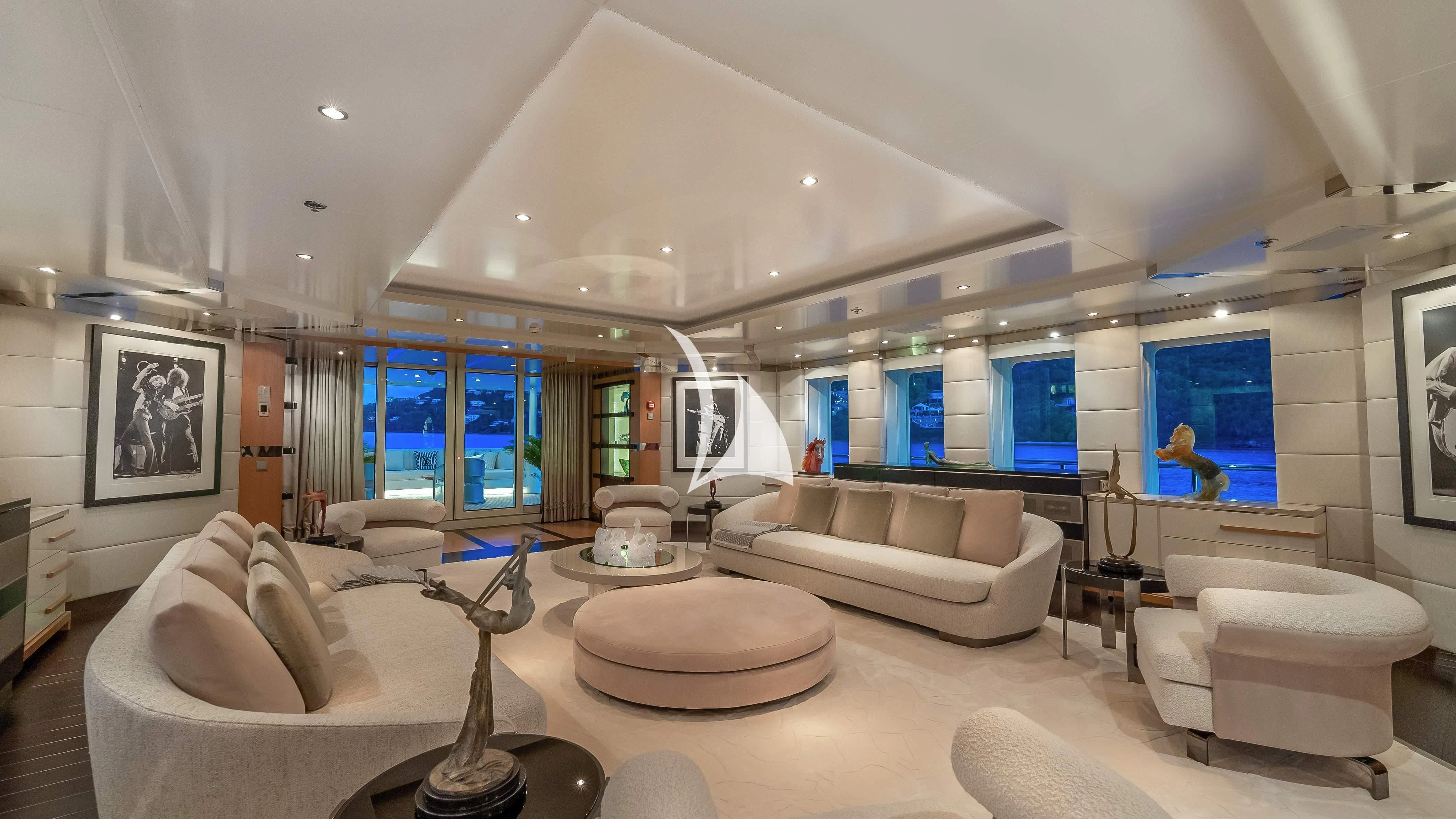 a room with a couch and a table aboard SCOTT FREE Yacht for Charter