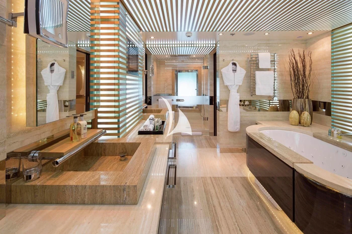a bathroom with a large mirror aboard SCOTT FREE Yacht for Charter