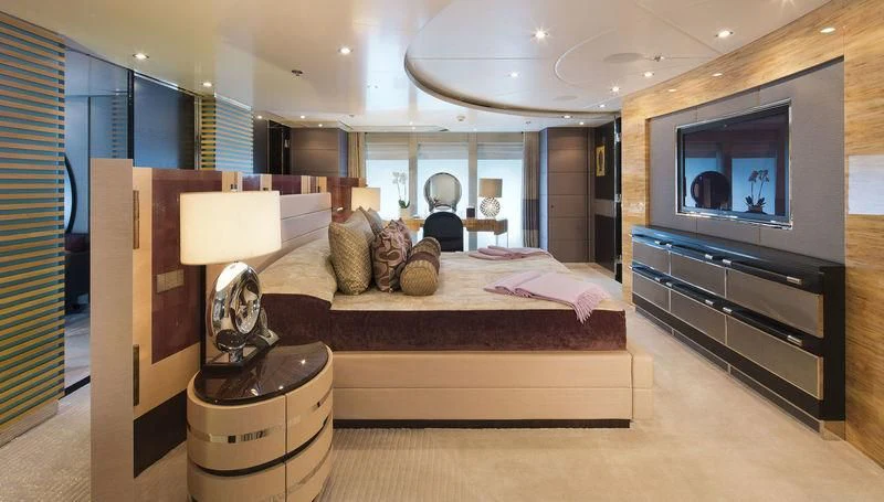 a bedroom with a large bed aboard SCOTT FREE Yacht for Charter