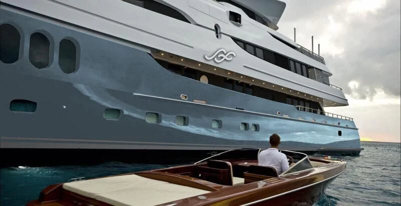 a person sitting on a boat aboard SCOTT FREE Yacht for Charter