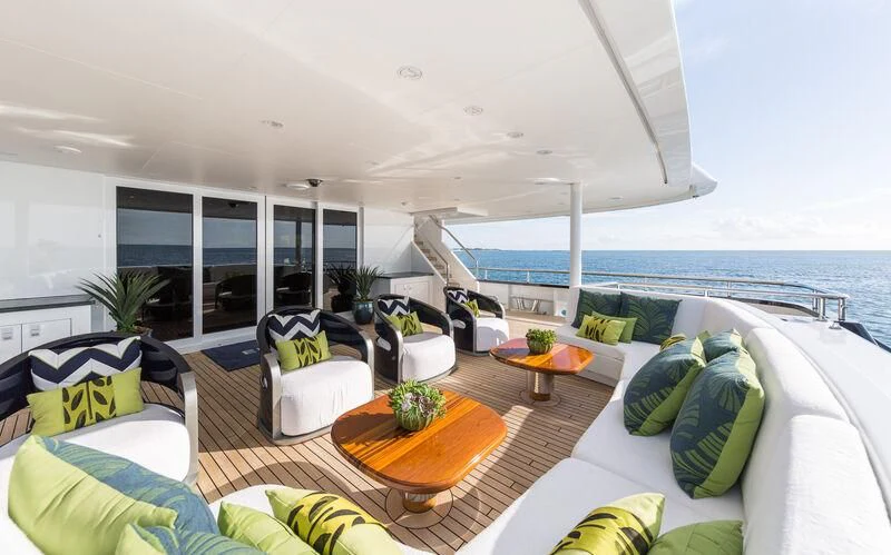 a living room with a large balcony aboard SCOTT FREE Yacht for Charter