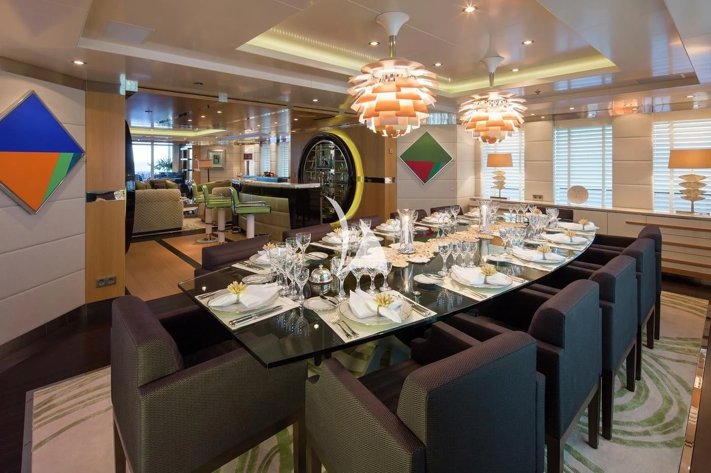 a large room with tables and chairs aboard SCOTT FREE Yacht for Charter