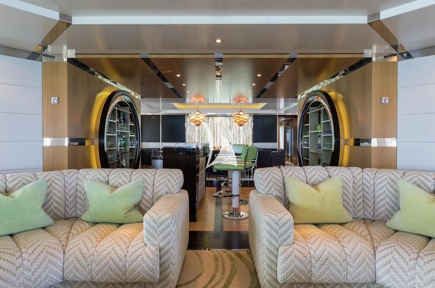 a living room with a chandelier aboard SCOTT FREE Yacht for Charter