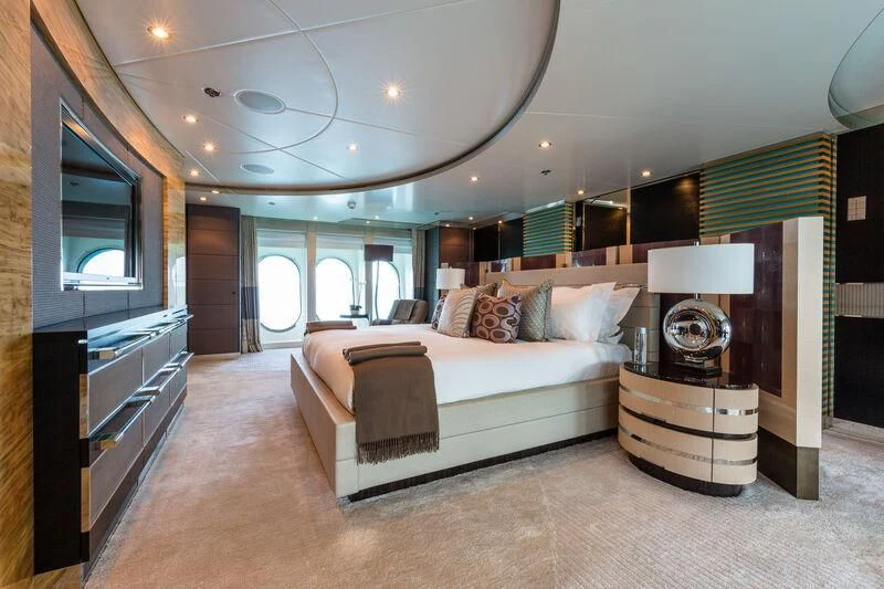a large bedroom with a large bed aboard SCOTT FREE Yacht for Charter