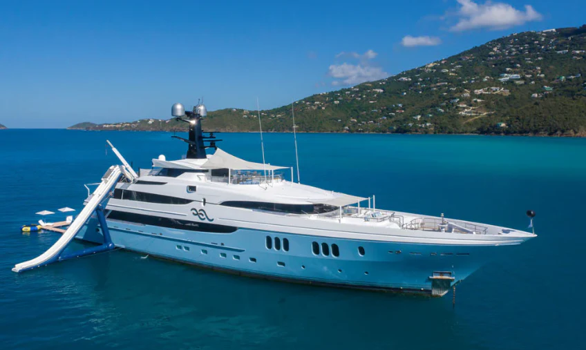 a large white boat in the water aboard SCOTT FREE Yacht for Charter