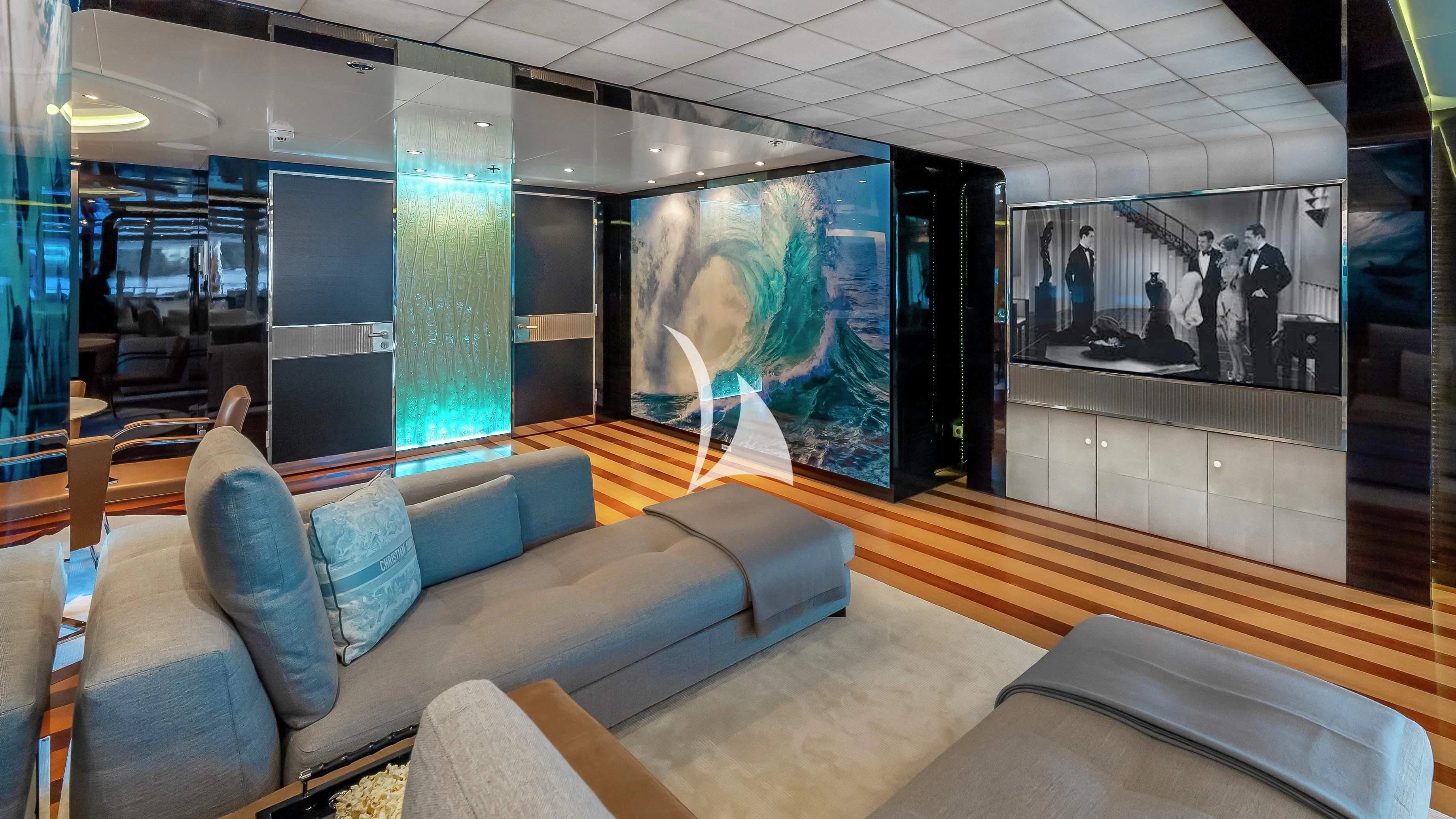 a room with couches and art aboard SCOTT FREE Yacht for Charter