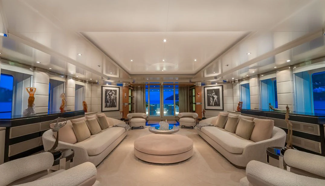 a living room with a large window aboard SCOTT FREE Yacht for Charter